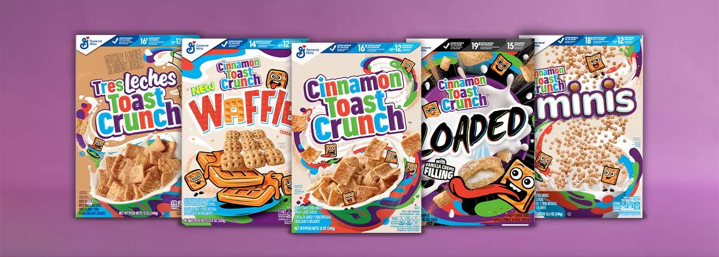 Arranged grouping of Cinnamon Toast Crunch Cereal boxes against a purple background.