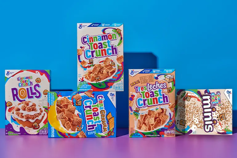 Arranged grouping of Cinnamon Toast Crunch Cereal boxes.